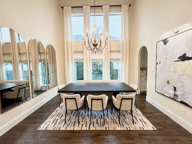 Beautifully transformed living space showcasing the work of professional interior design, with modern furnishings and a harmonious color palette.