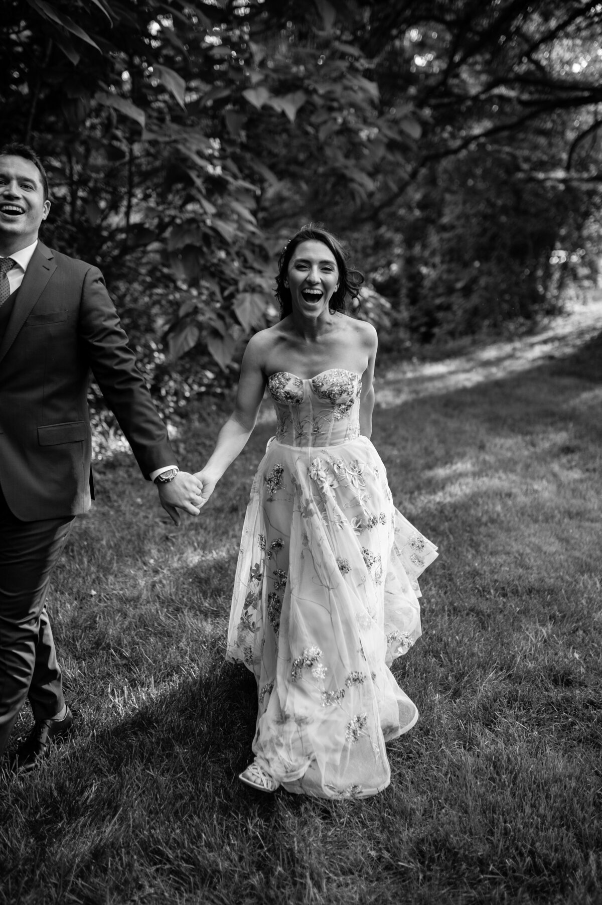 bride groom laughing at wedding