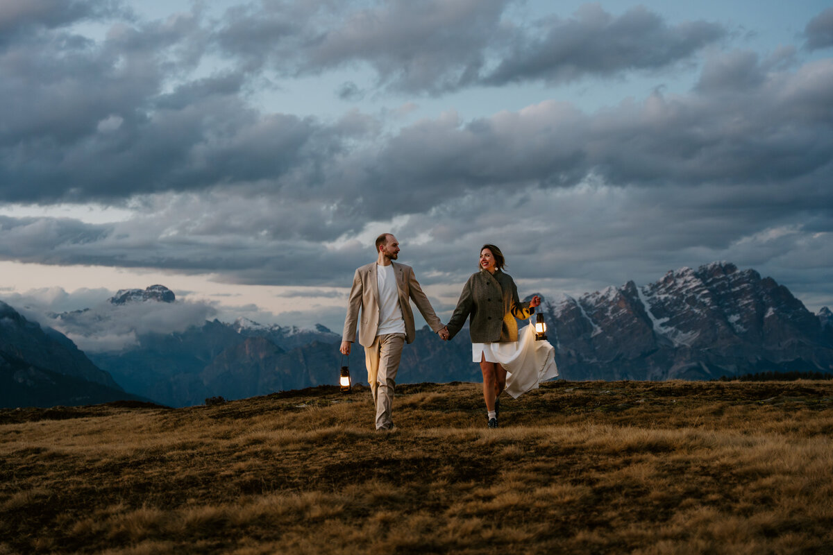 romantic couple during twilight elopement in Dolomites