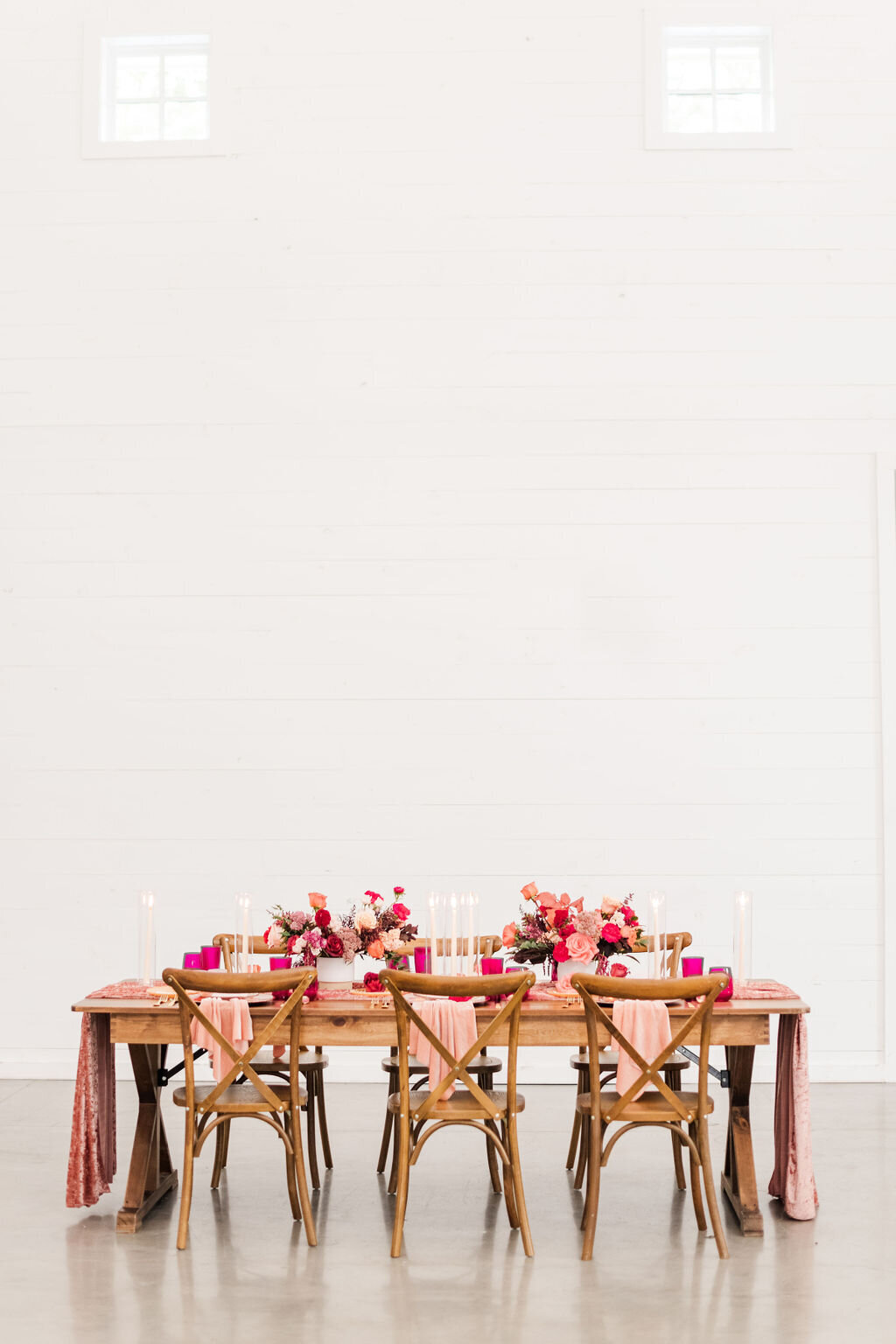 beautiful tablescape with exposed table and low florals