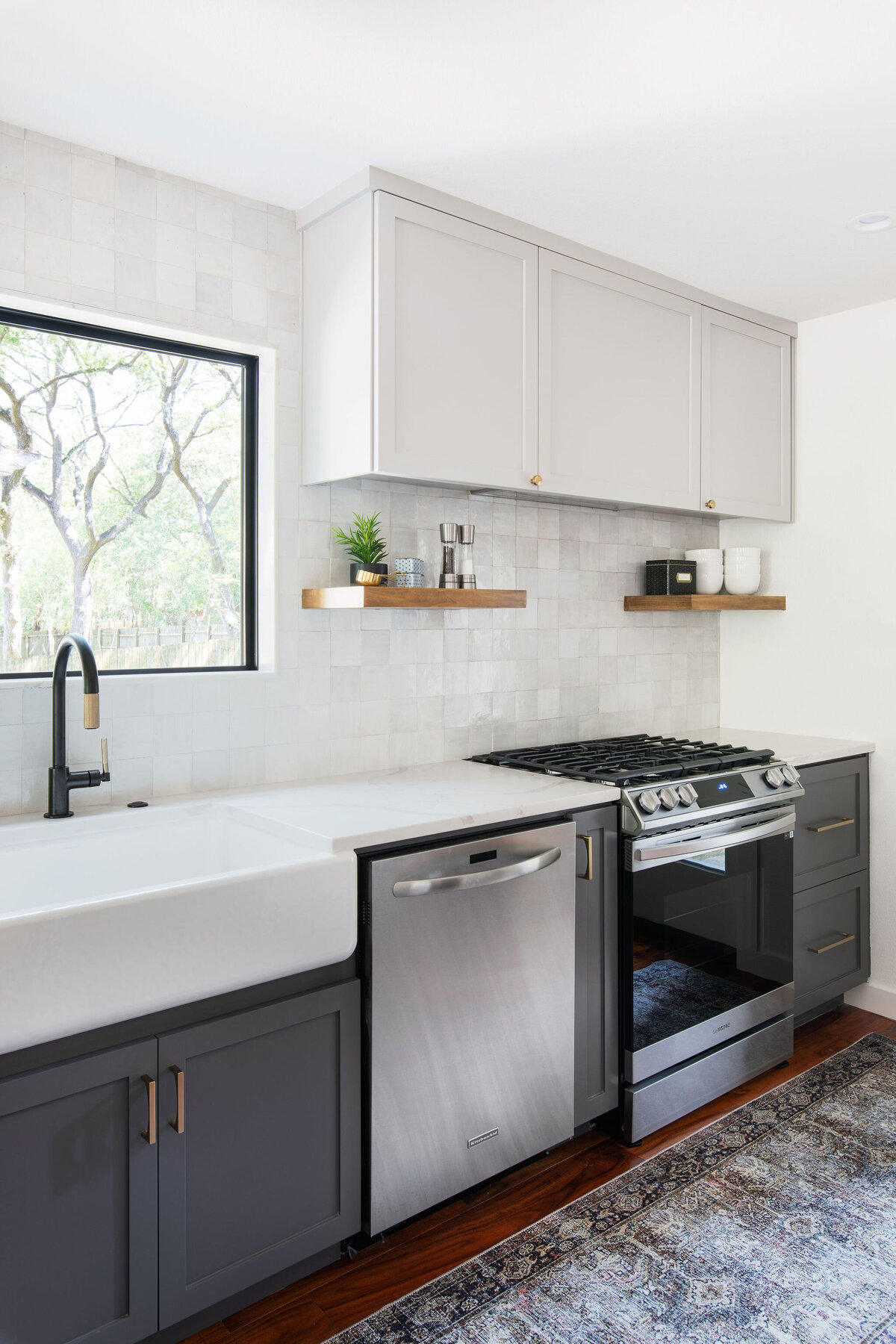 hello-home-two-tone-cabinets-kitchen-remodel-hardwood-flooring-quartz-window-jamb-zellige-backsplash-austin-13
