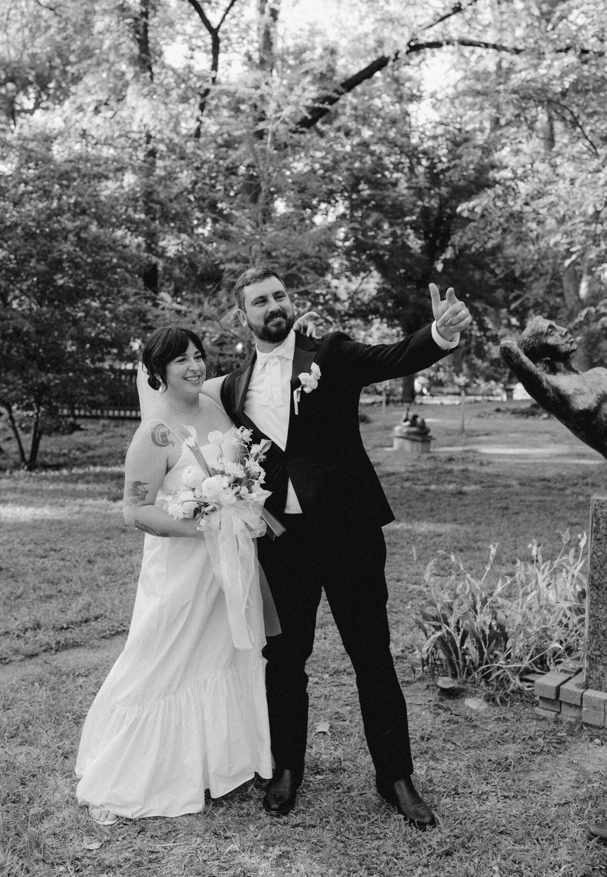 Bride and groom in the Umlauf Sculpture Garden, Austin