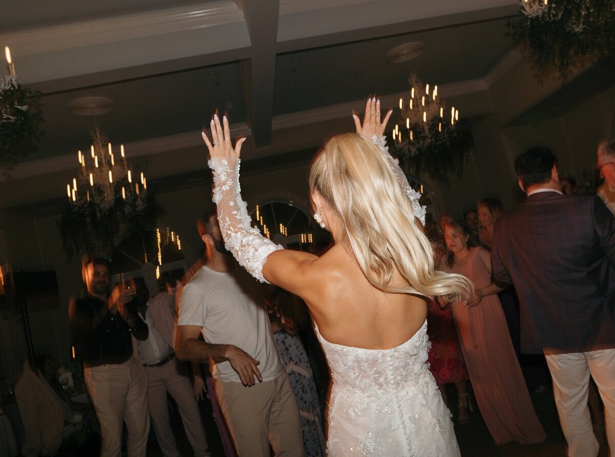 film wedding photography of bride dancing at wedding reception