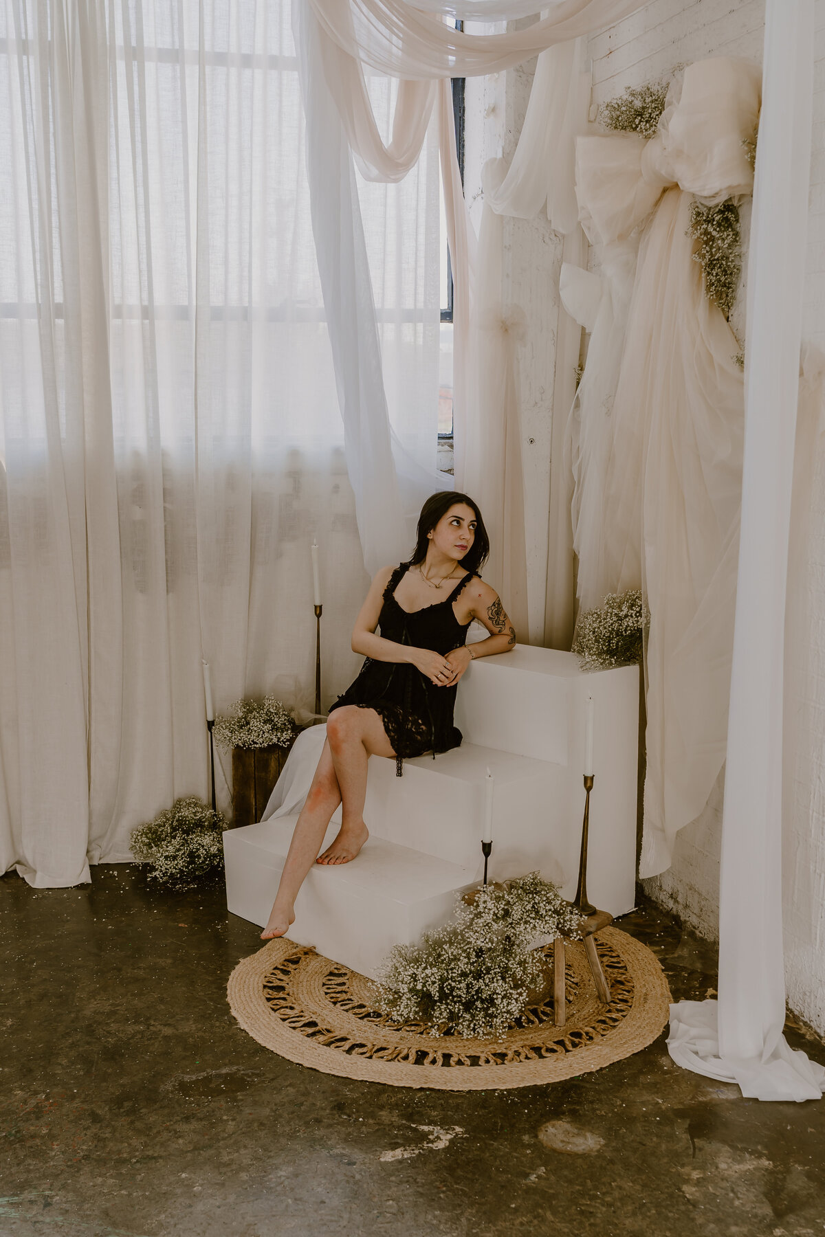 relaxed-pose-on-stairs-boudoir-the-storyteller-studio-des-moines-storyteller-collective-photo-co