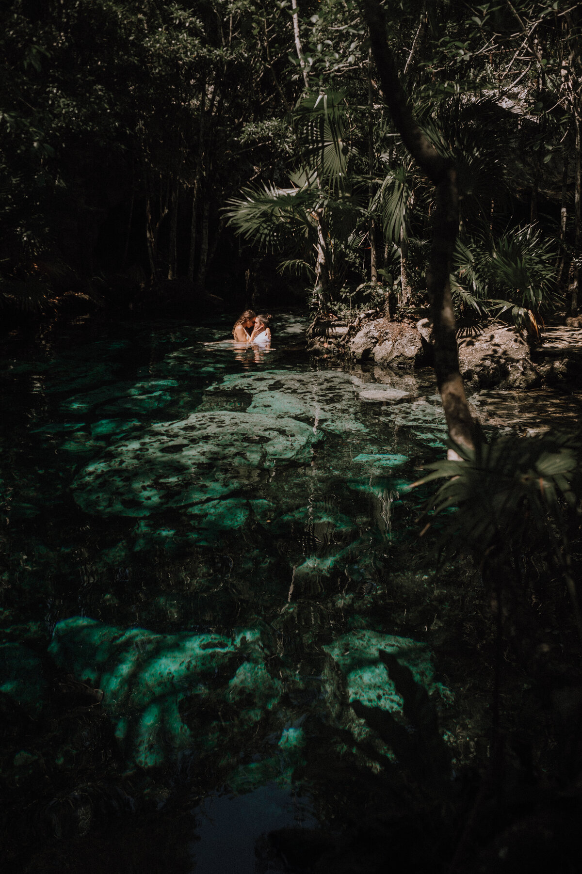 Trash the dress session at a cenote in Tulum