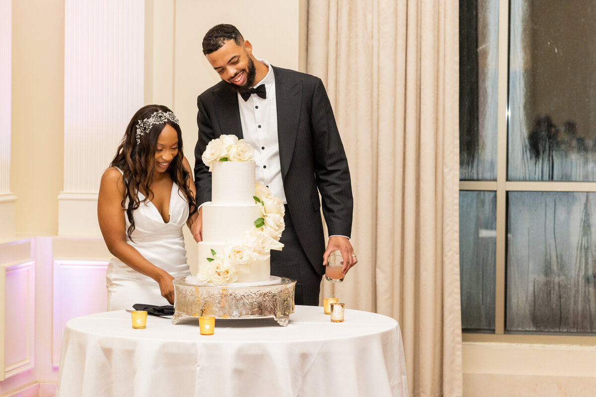 Cake cutting with bride and groom Reception Hall at the Atlanta Historical Society