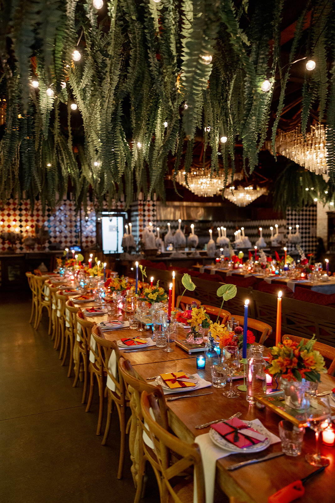 colorful candles and flowers long table wedding