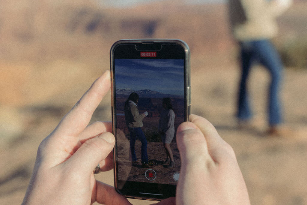 A phone recording a couple talking.