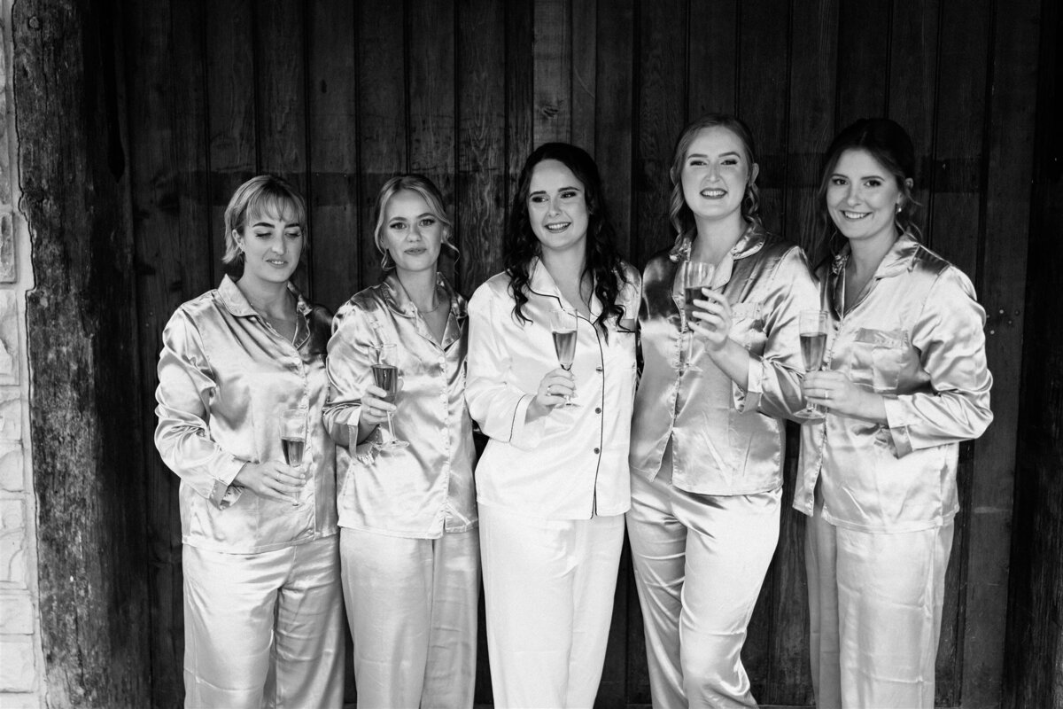 Experience the joy and excitement as the bride prepares for her wedding with her friends, capturing unforgettable moments of laughter, love, and anticipation.