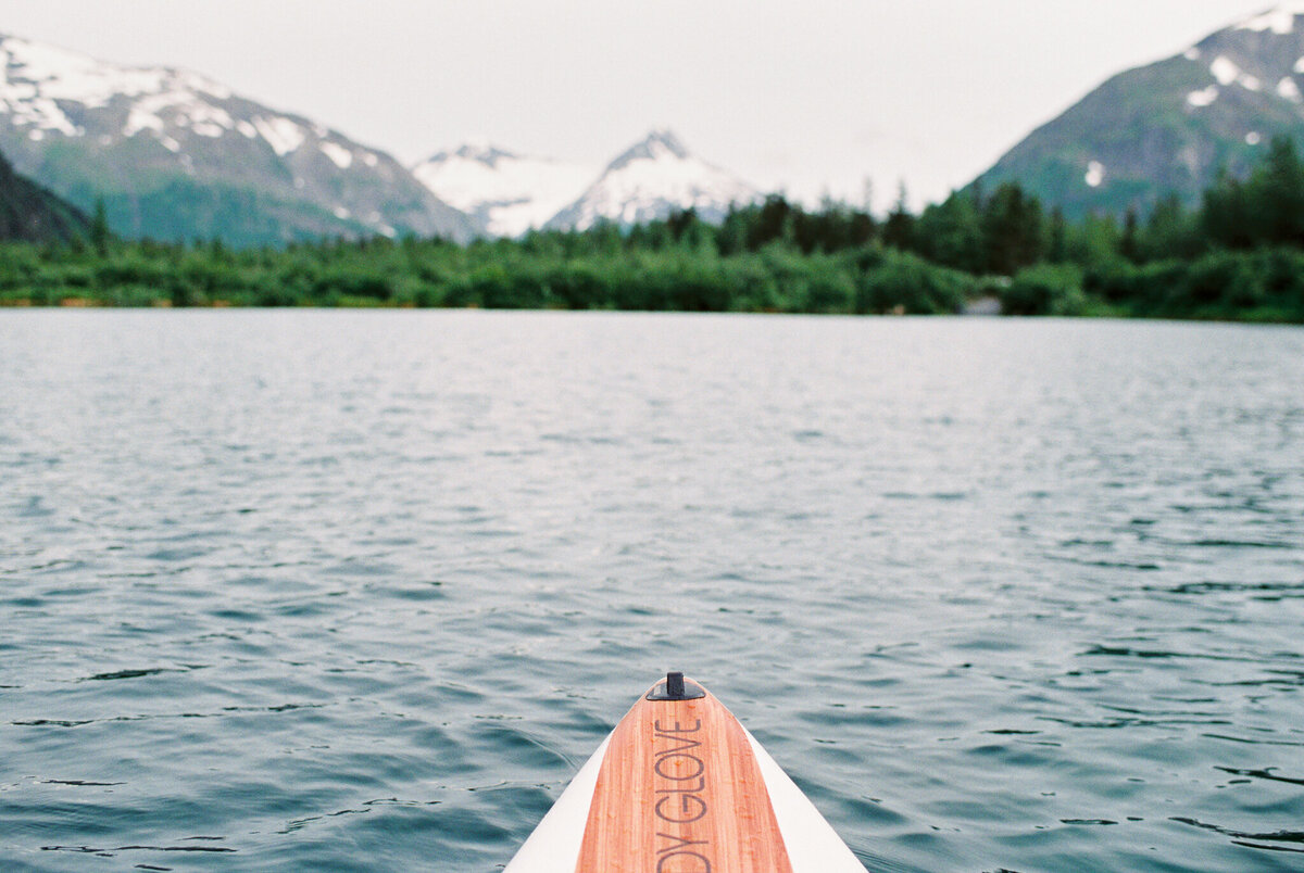 paddle board on Alaska lake