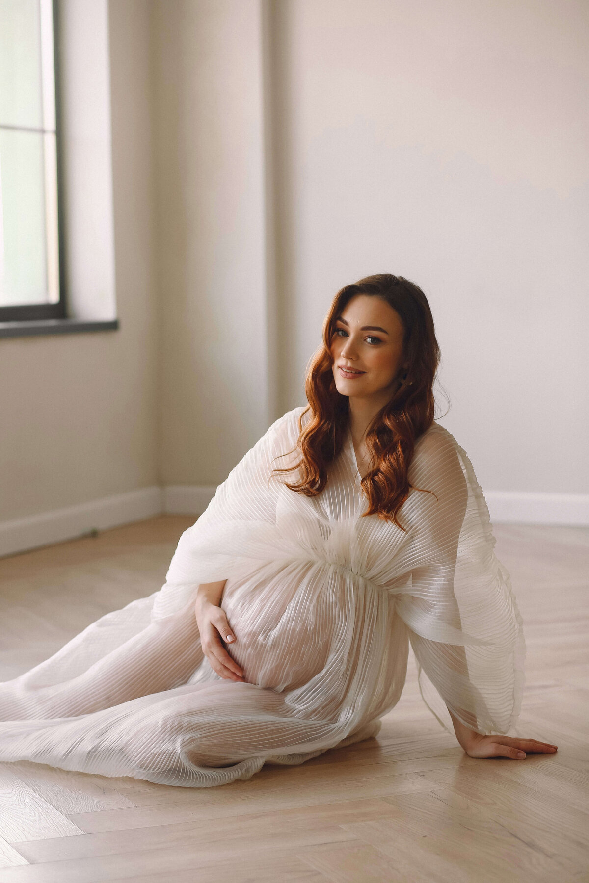 portrait-beautiful-pregnant-woman-stylish-white-dress-posing-studio-happy-motherhood (1)