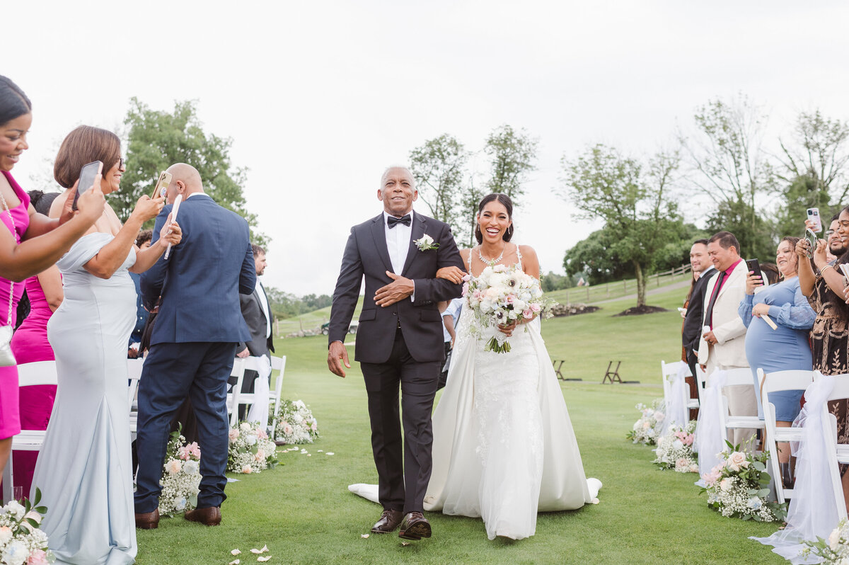 bride-and-father-of-bride-walking-down-aisle