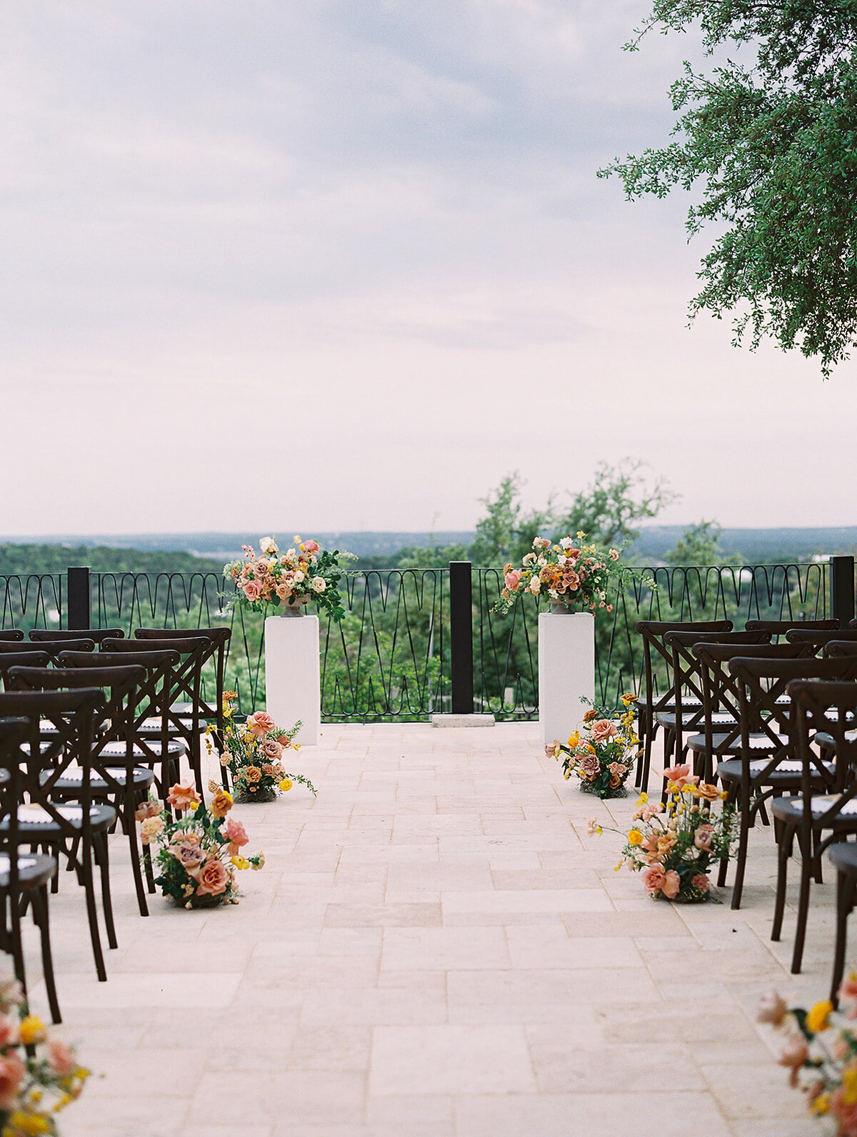 The romantic and simple ceremony decor overlooking the Texas Hill Country