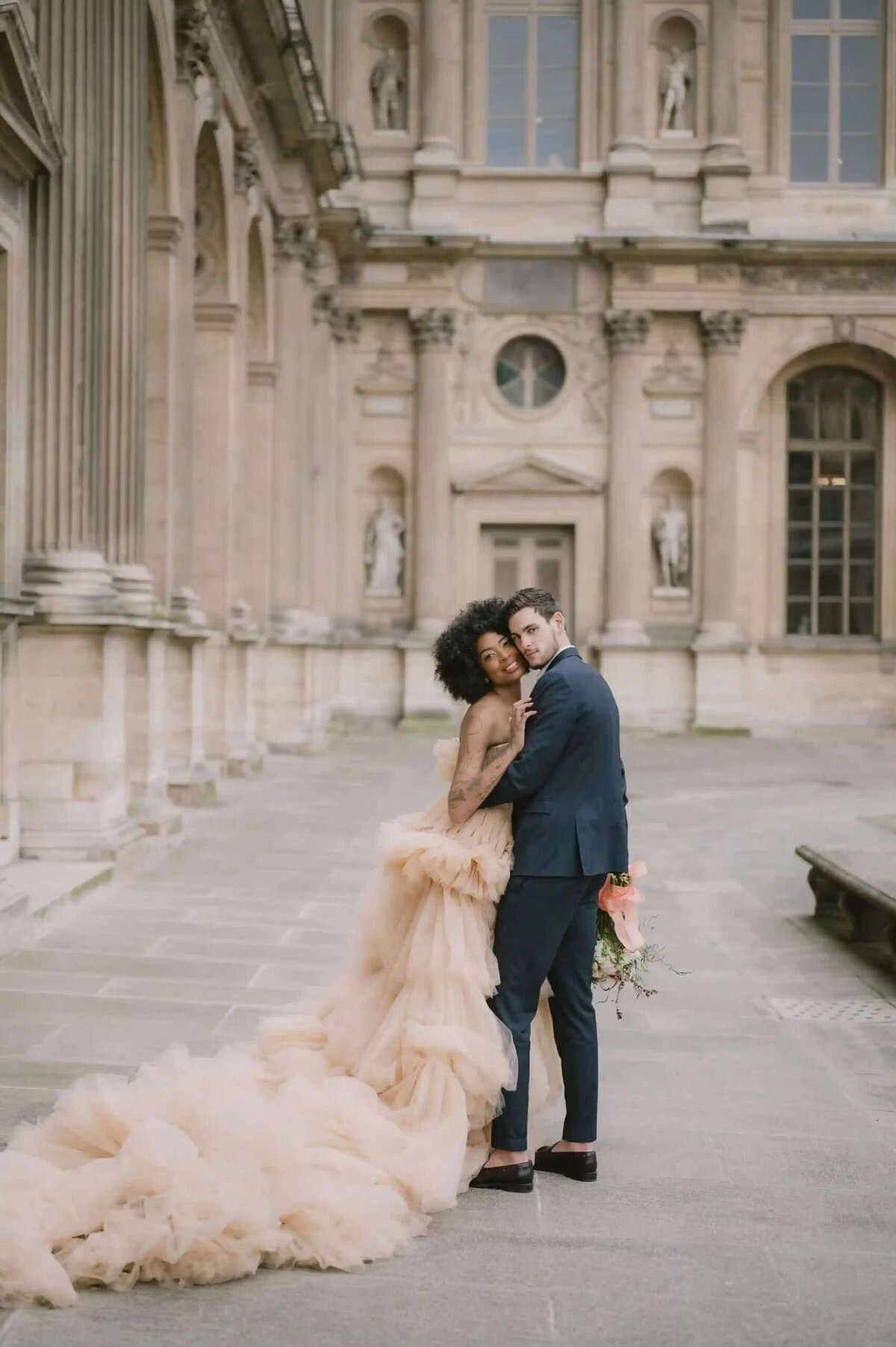 a couple having a photoshoot in paris