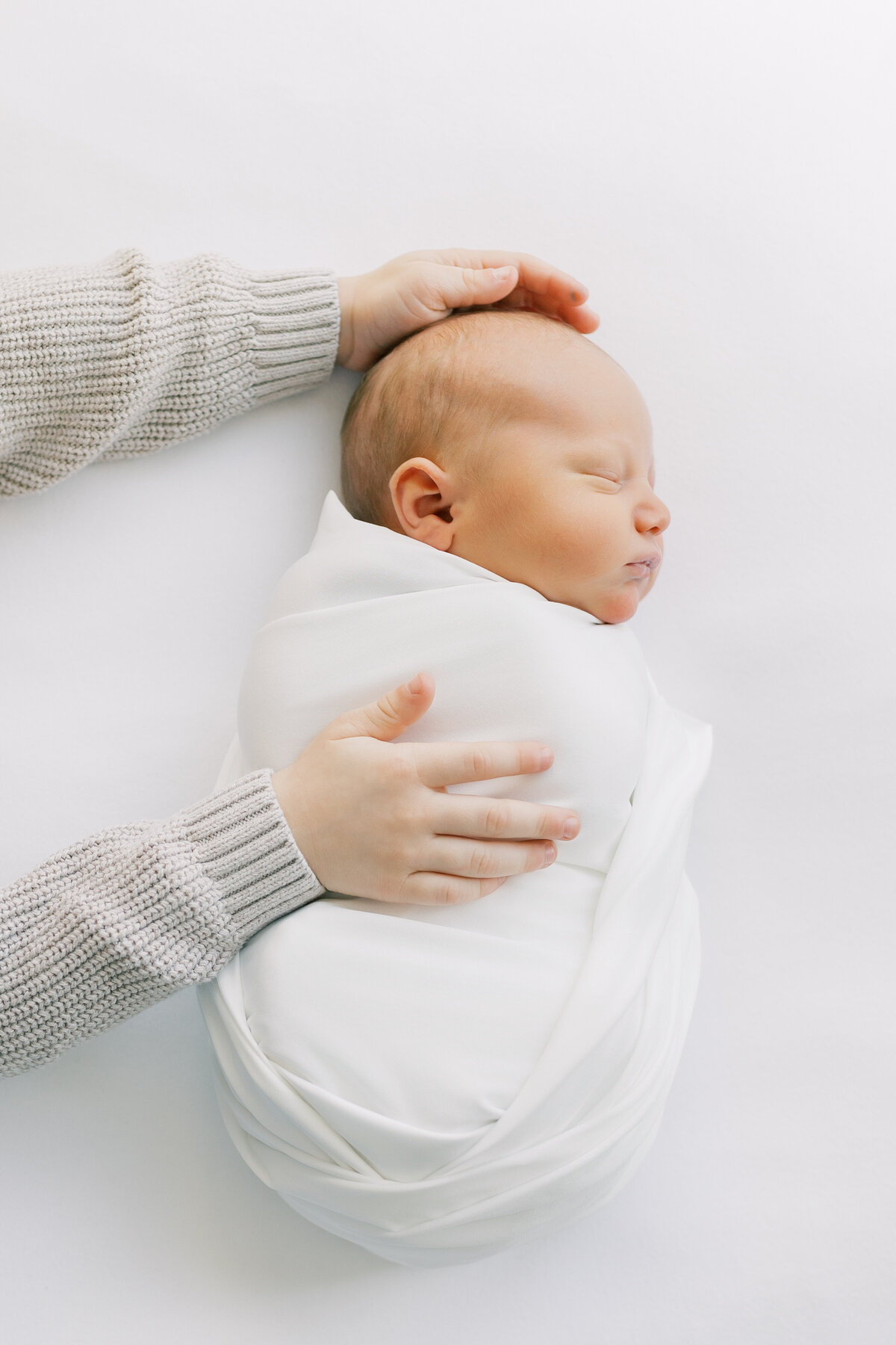 baby-boy-in-white-swaddle