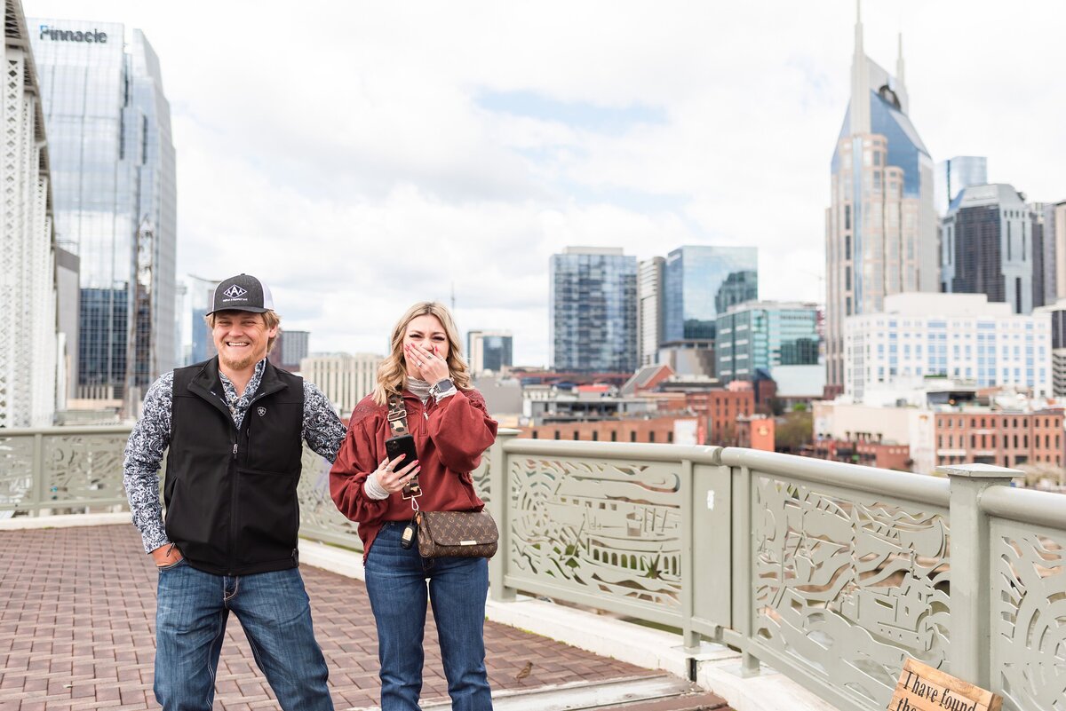 Surprise-proposal-photos-in-Downtown-Nashville-Pedestrian-Bridge+19