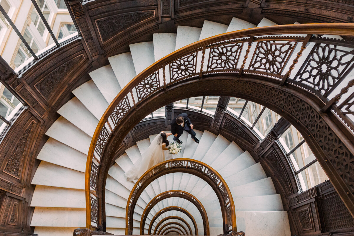 A classic wedding photo at the historic Rookery Building in downtown Chicago