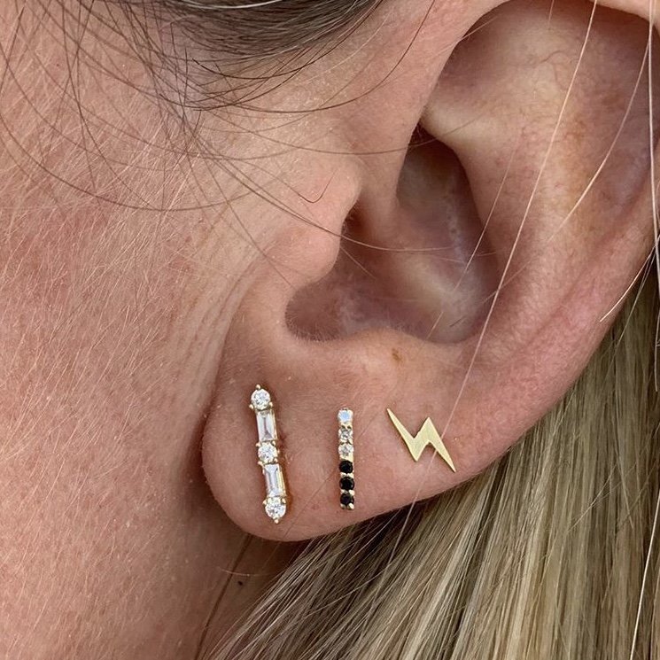 Ear piercing three Kalen Ashford