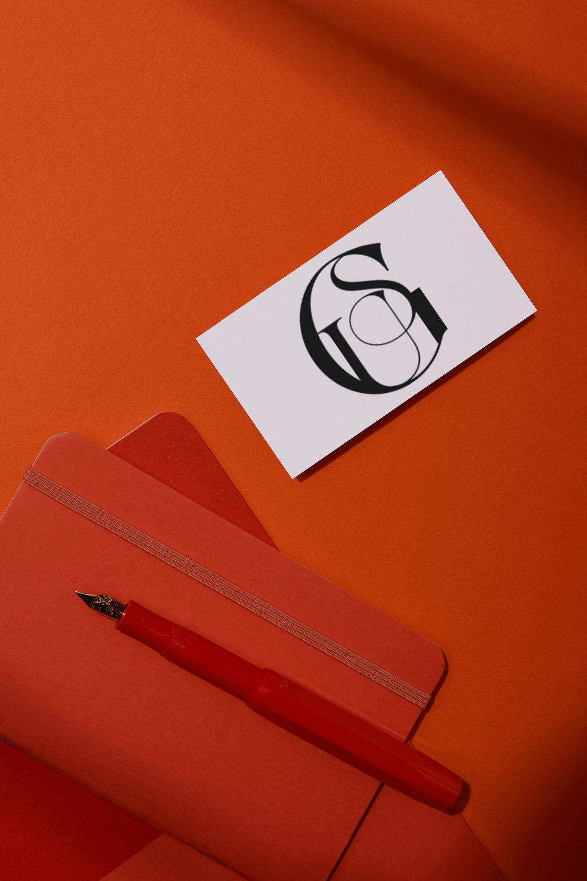GSU submark logo on  a business card on a red background stationary set