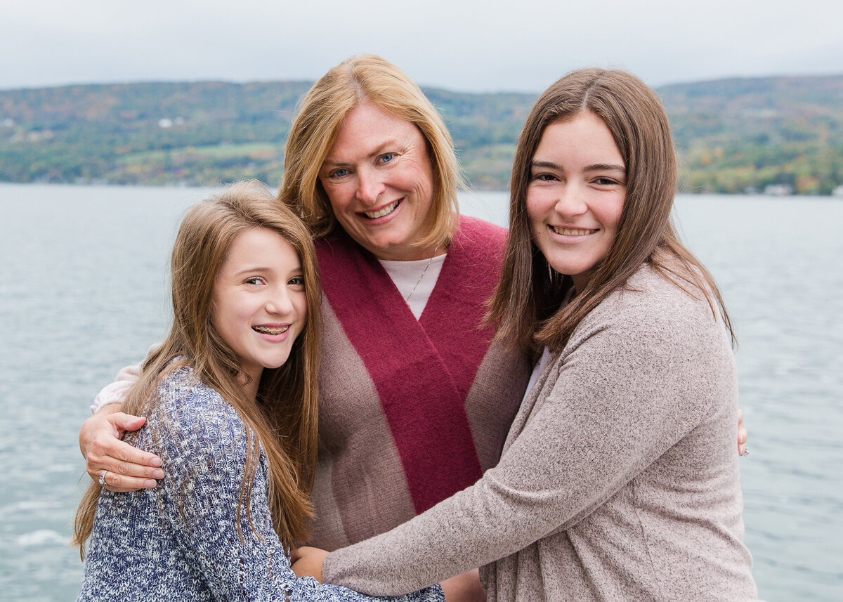 fall family photo of mother and 2 daughters