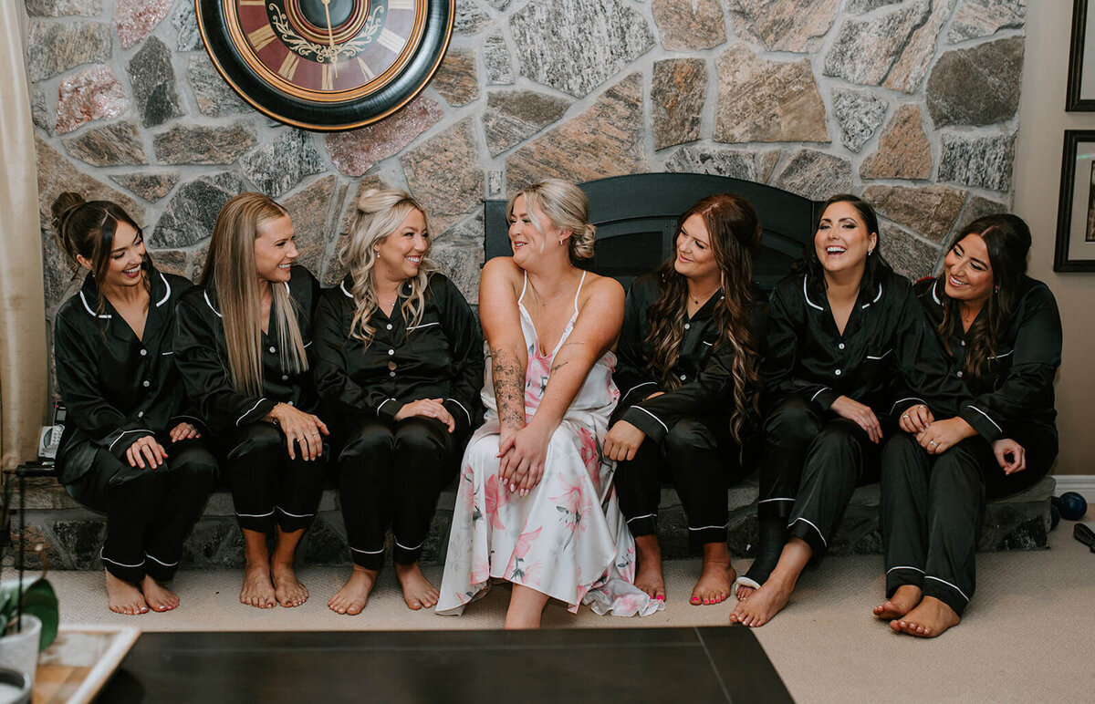 Bride-with-bridesmaids-sitting-in-pjs