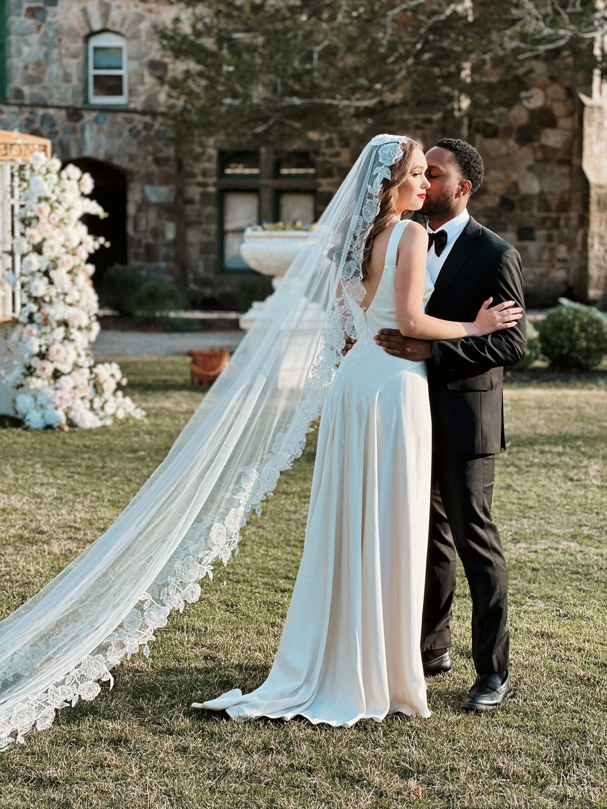 Bride wearing custom mantilla veil for timeless bridal look