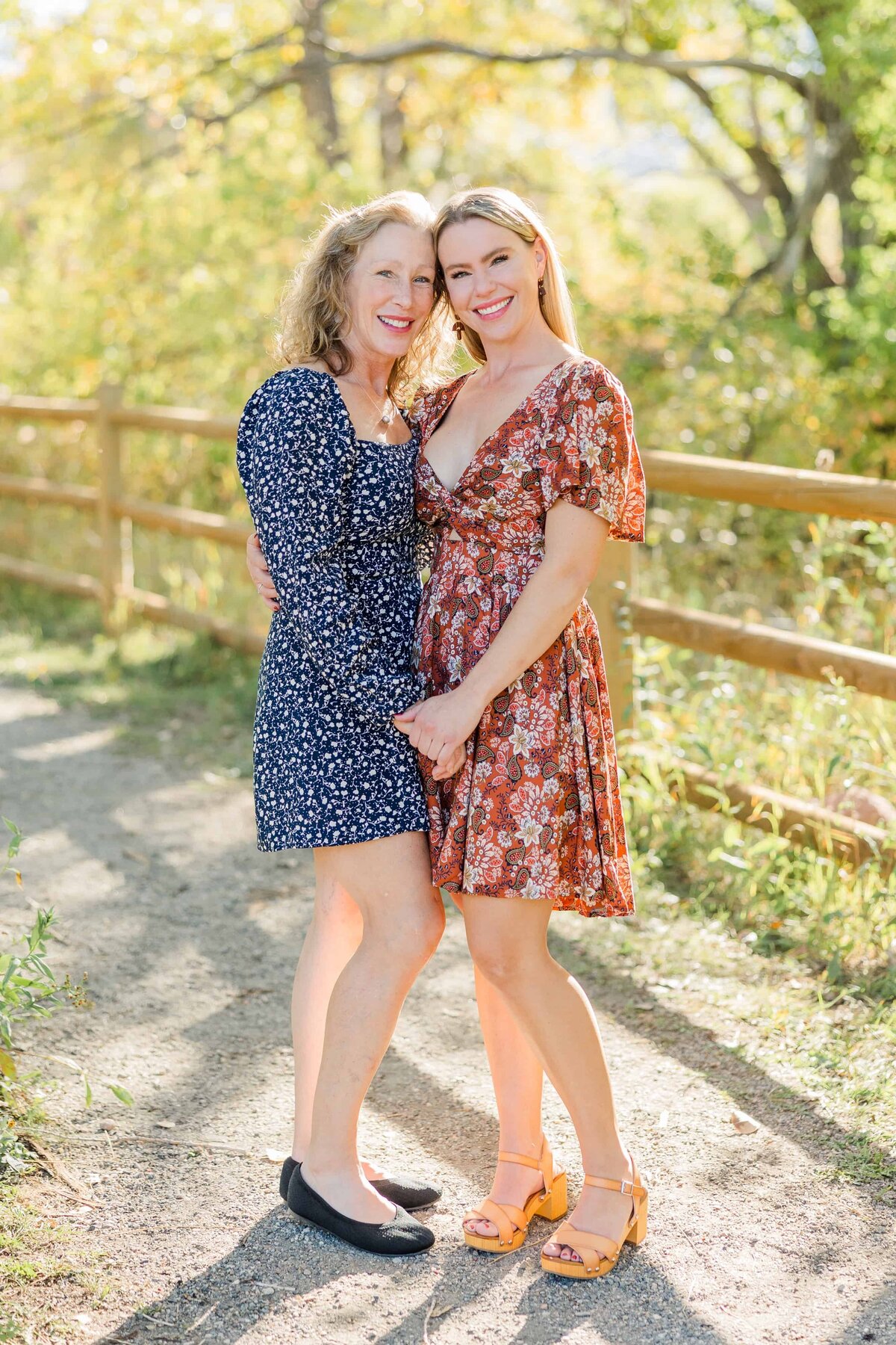 Mother and daughter pictures with fall leaves