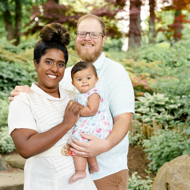 family photograph of a mother and father with their toddler daughter in Lewiston, NY