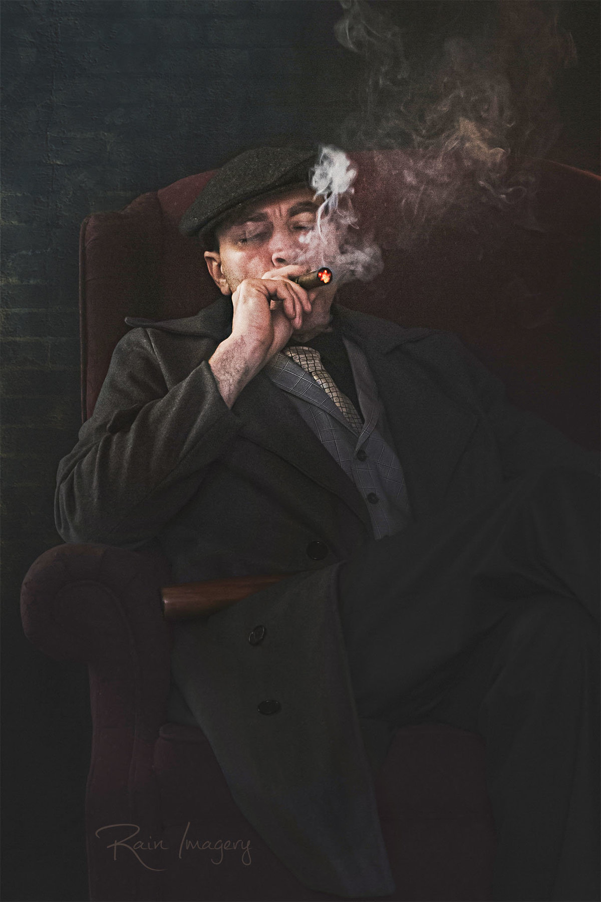 Portrait of a man smoking a cigar