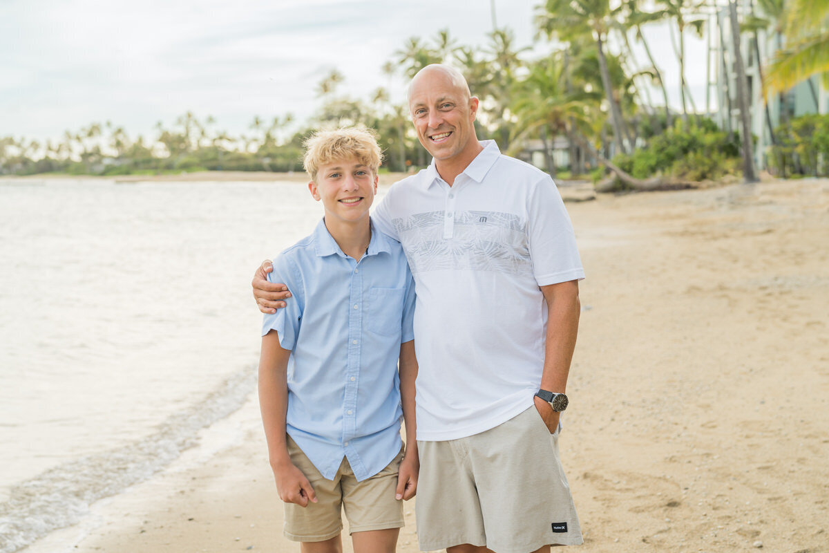 farther and son Beach photo with palm trees