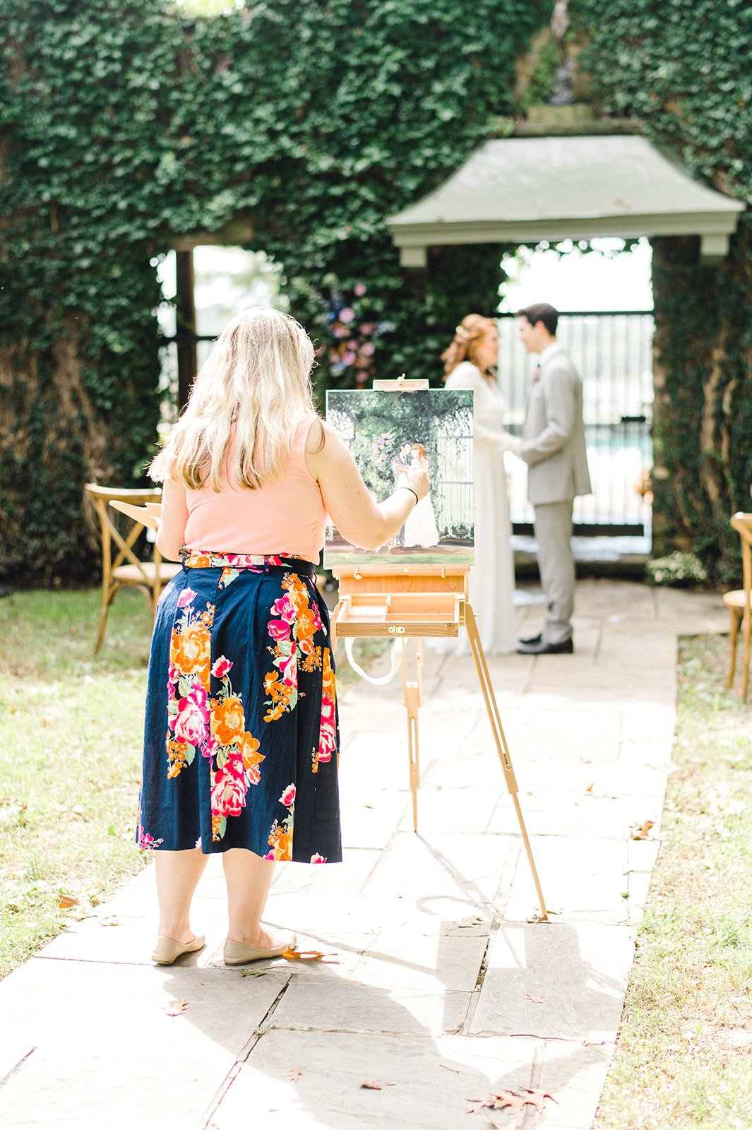 Live wedding painter at styled shoot