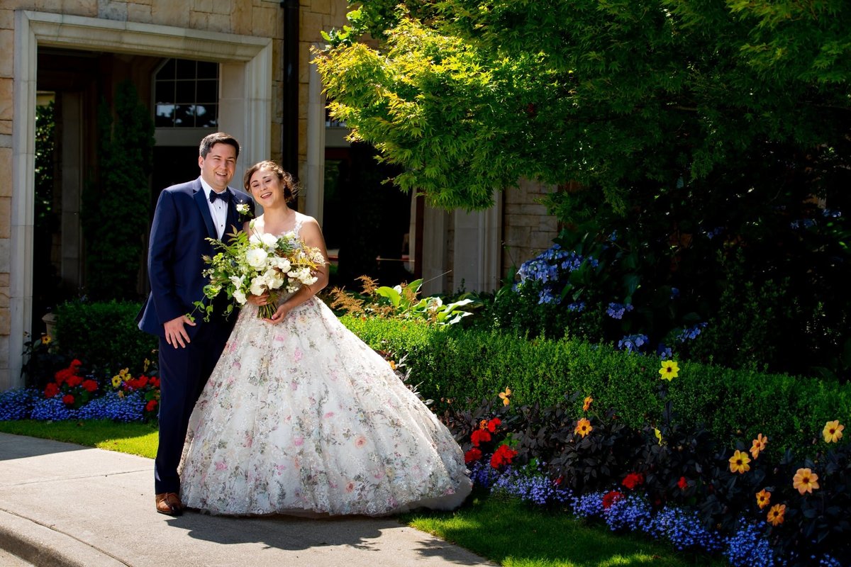 Bride and Groom at their Newcastle wedding, bride in floral print wedding dress