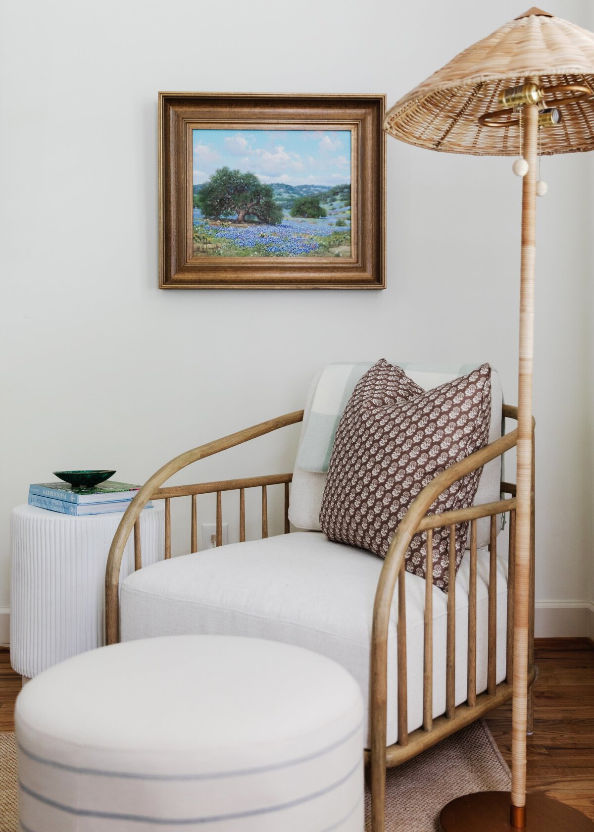 oyster creek studios oak forest remodel wooden chair with white cushion and wicker floor lamp in bedroom