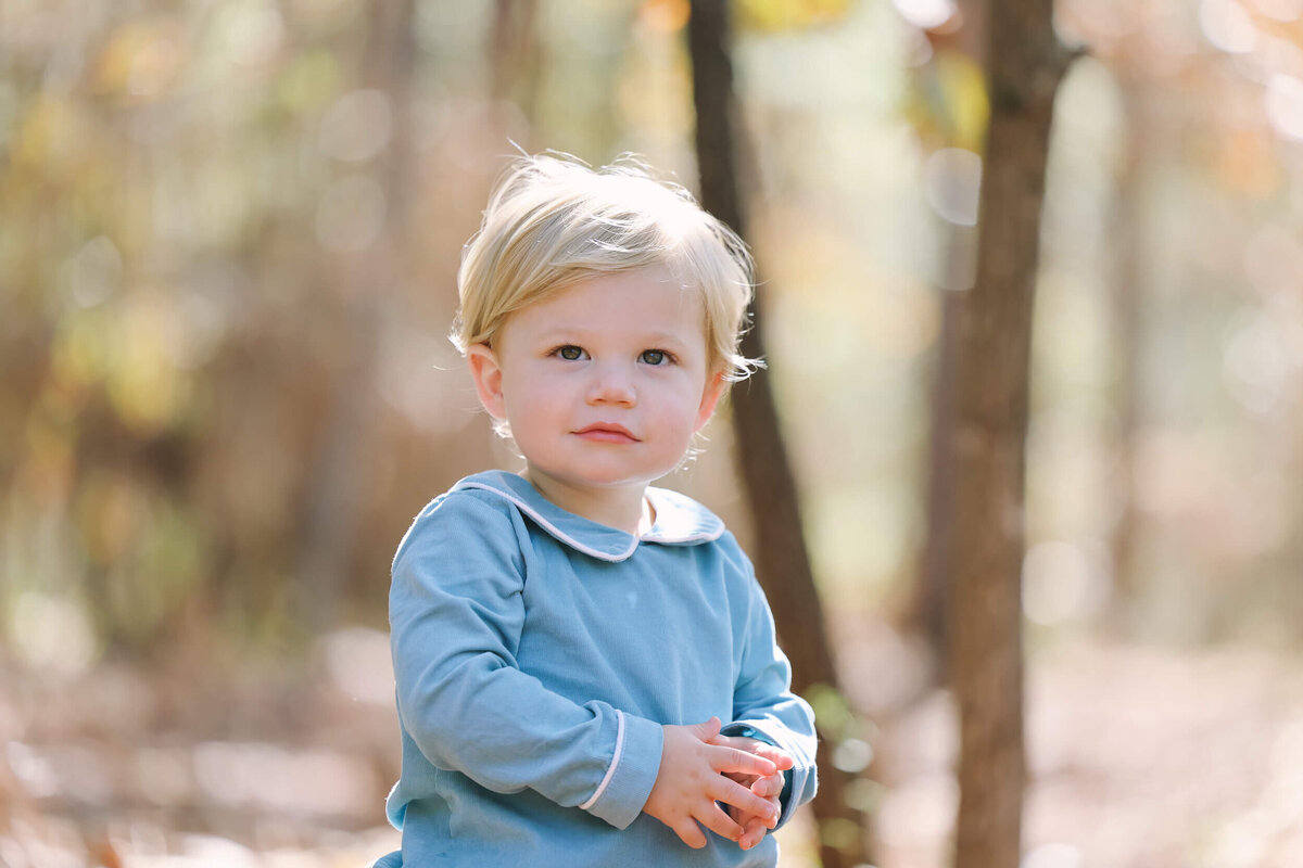 toddler-standing-in-woods-1