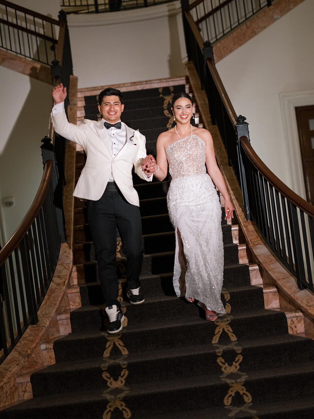 couple-exiting-staircase-coral-gables-2SA-W