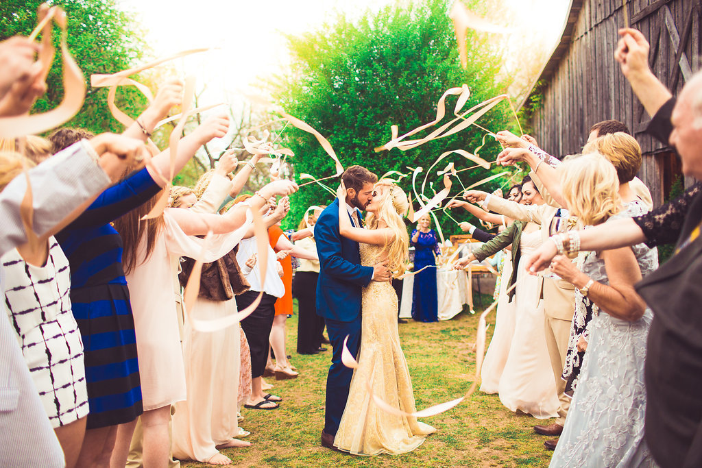Wedding Photograph Of Visitors Waving Their Wedding Wands To The Newlywed Los Angeles