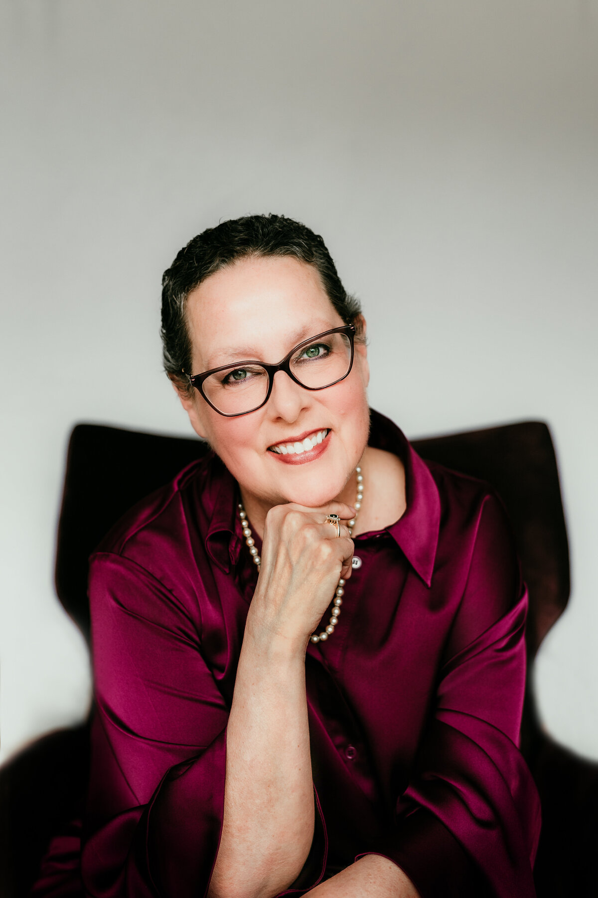 Polished headshot designed for a professional speaker and author’s bio, website, and media kit.