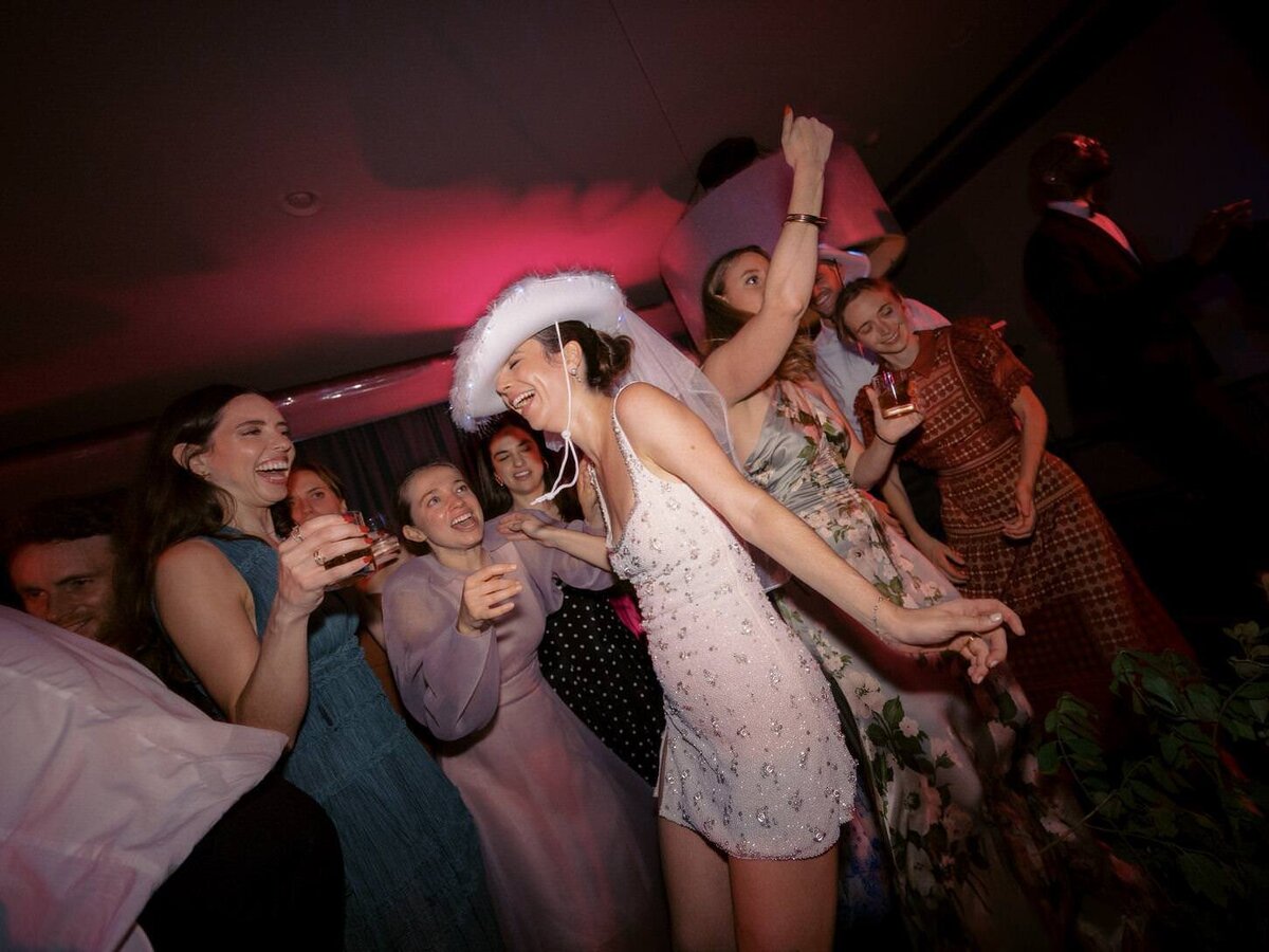troutbeck-45-bride-and-groom's-entrance-with-excitement-at-reception-at-troutbeck-jenny-fu-studio