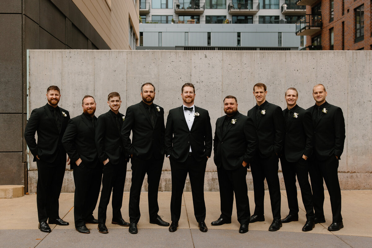 groomsmen-black-suits-neutral-wedding