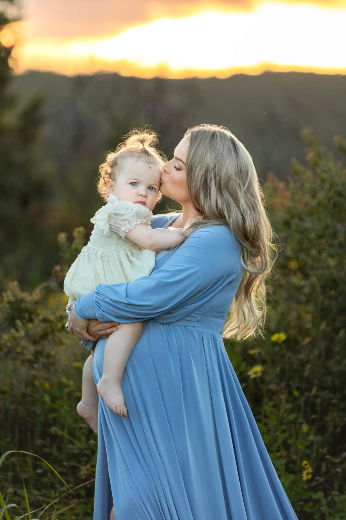 Pregnant mom and her baby daughter photographed in Woodland Hills Park by maternity photographer Elsie Rose Photography