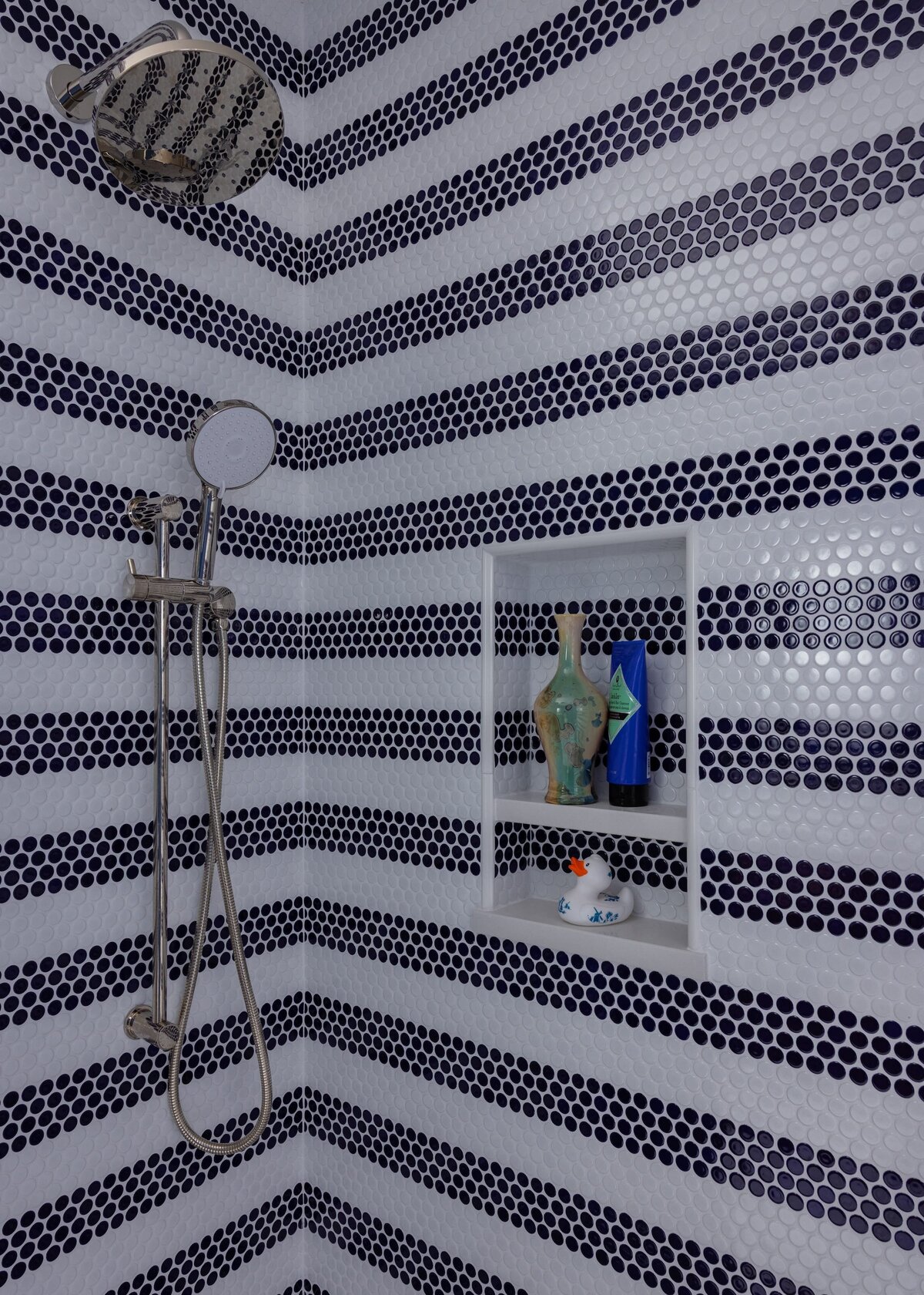 melinda chesson interiors poindexter bathroom shower white and navy penny tile