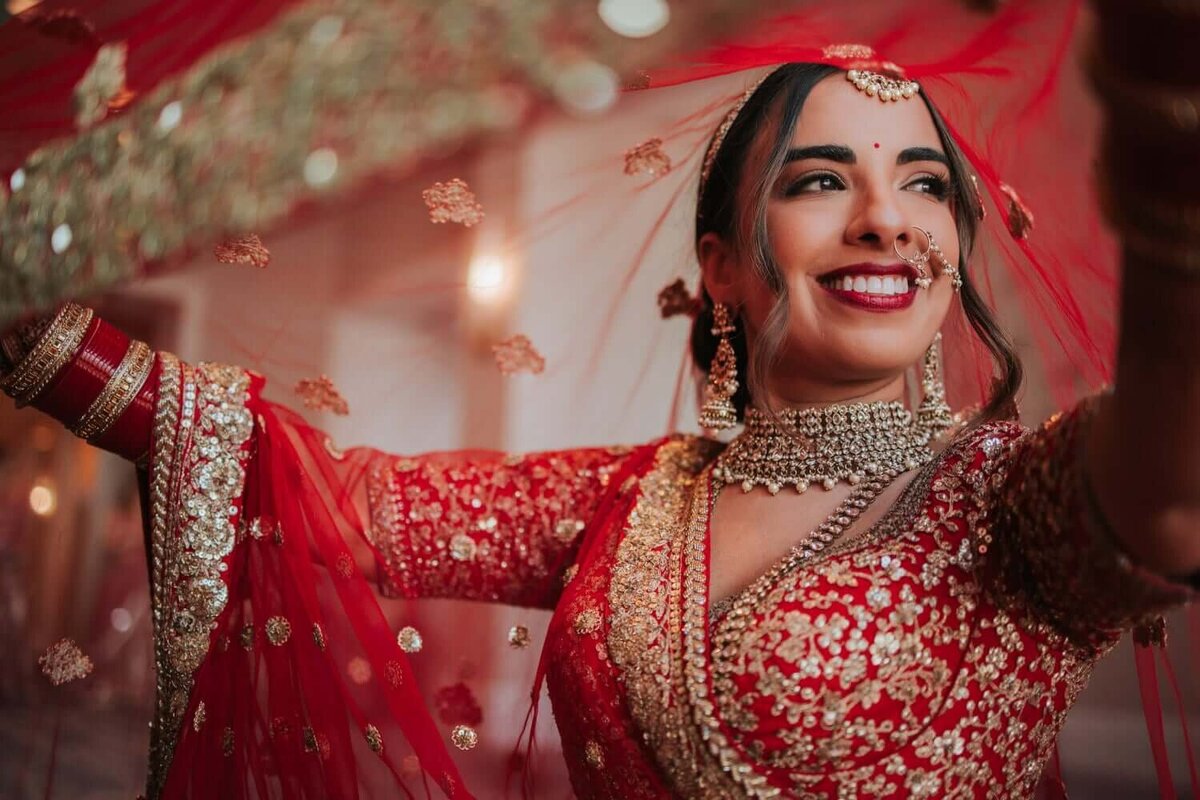 Indian bride under her vail during bridal portraits