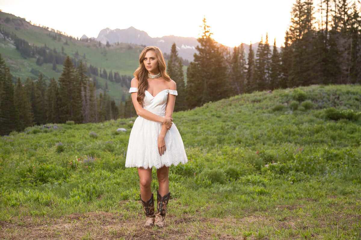 Modeling and senior photography for girl in white dress in Albion Basin, Utah.