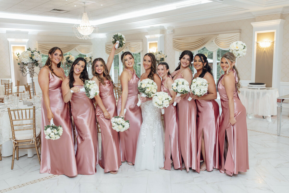 English Manor | Bridesmaids dancing and laughing in ballroom during wedding | Ocean Township, New Jersey