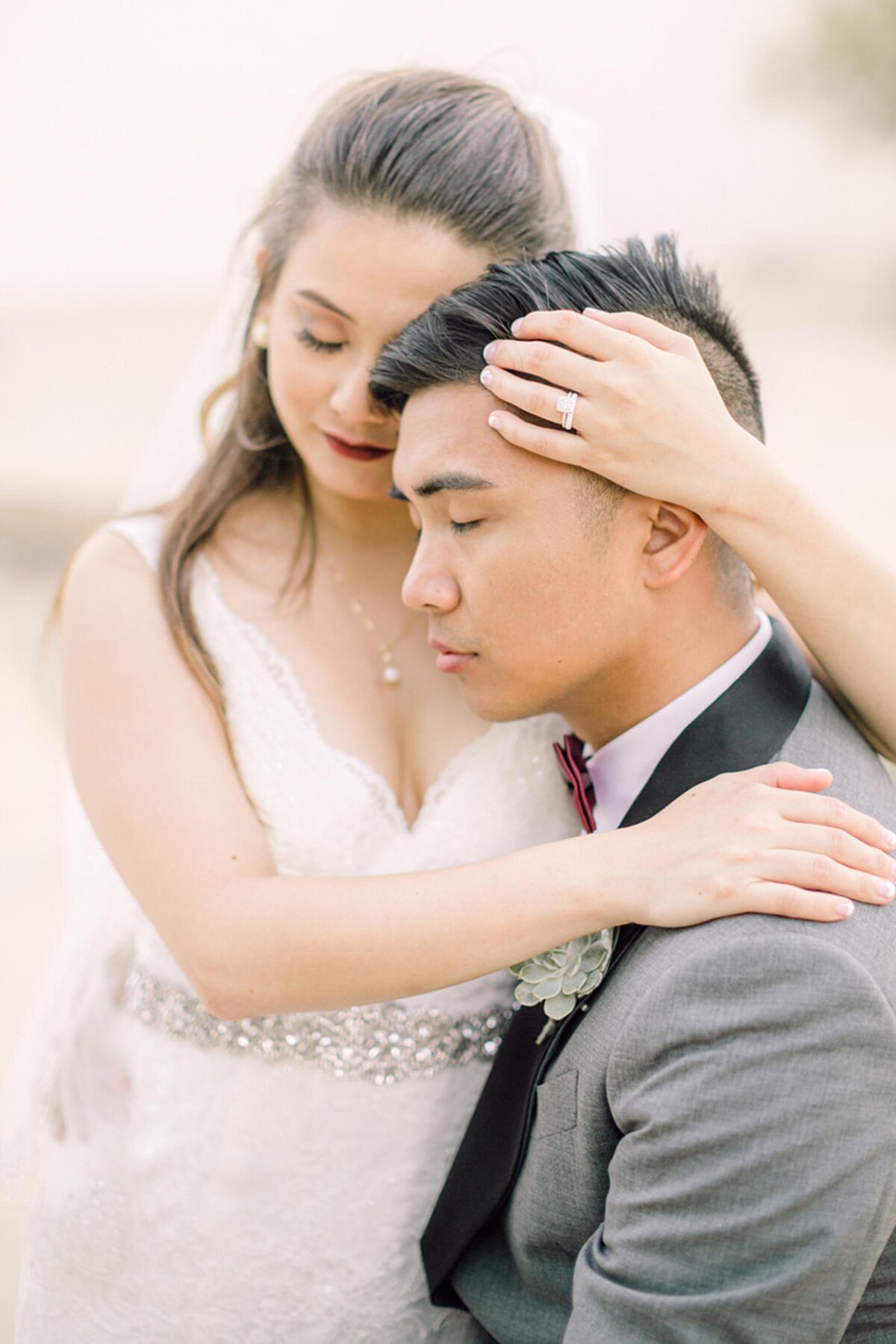 macy-yap-photography-bride-and-groom-embrace-vancouver-wedding