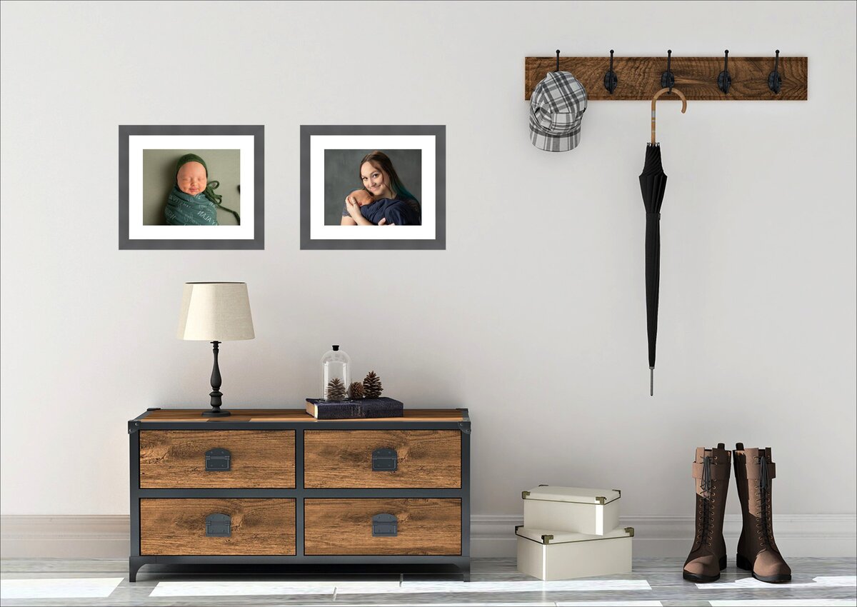 Stylish entryway mockup for Indian Land, SC, new mom,featuring framed newborn and motherhood portraits by Insley Photography Fort Mill SC. Complements entry table, hat rack, lamp, storage boxes, and pine cones. Virtual interior design services included