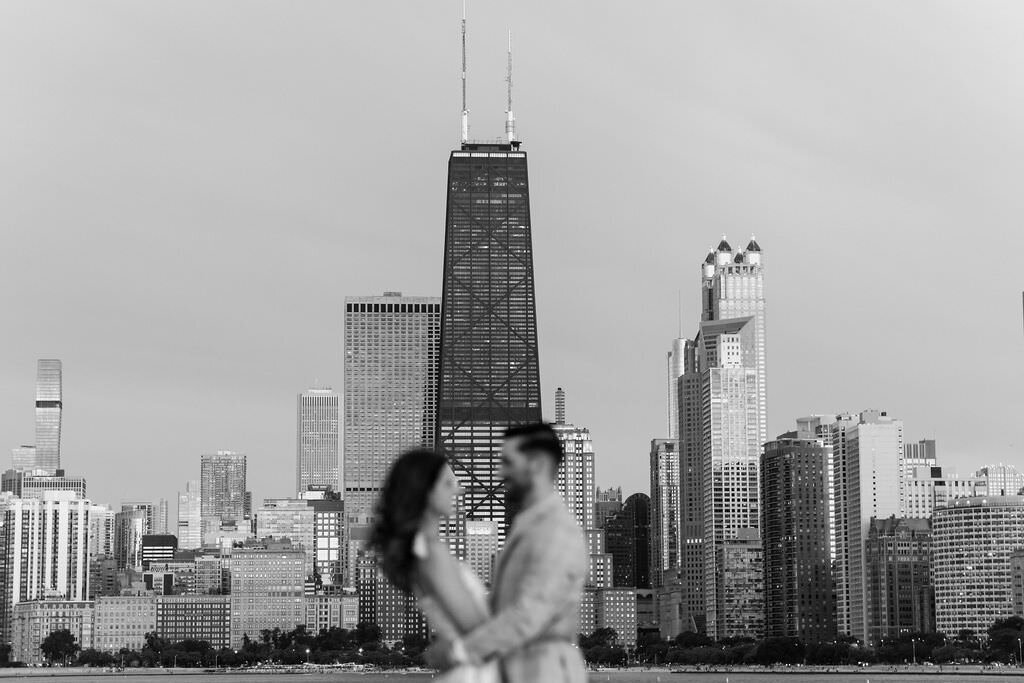 An engagement photography session at The Wrigley Building and North Ave Beach in Chicago, Illinois - 47