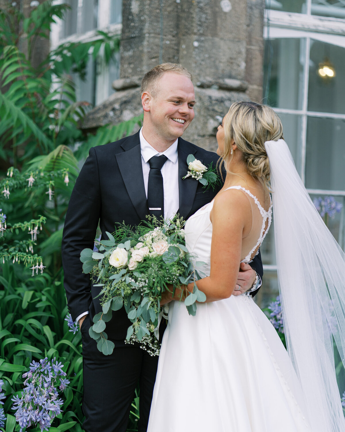 Bride and groom at black tie country house wedding