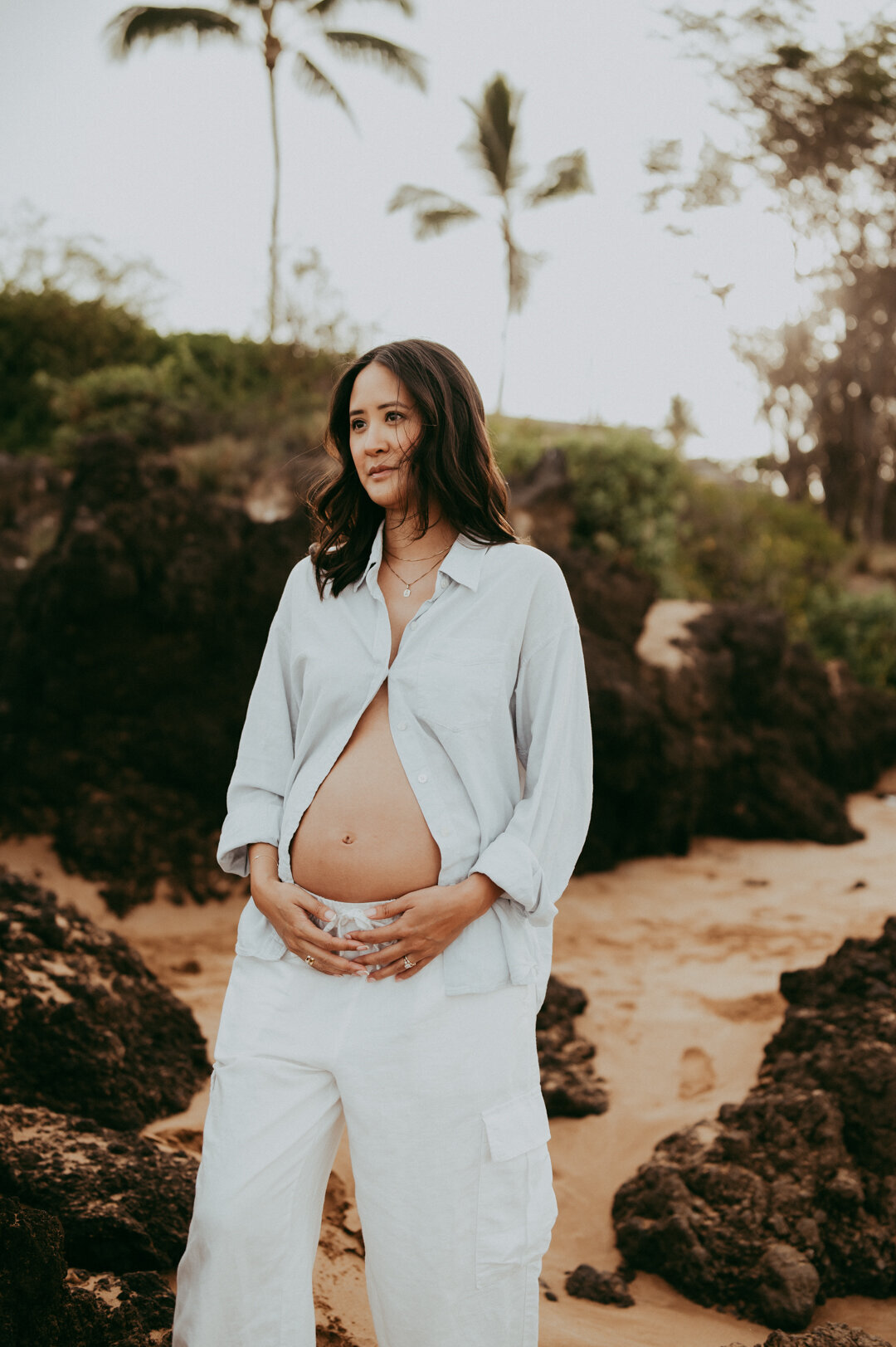 pregnant woman posing for photos at maternity session