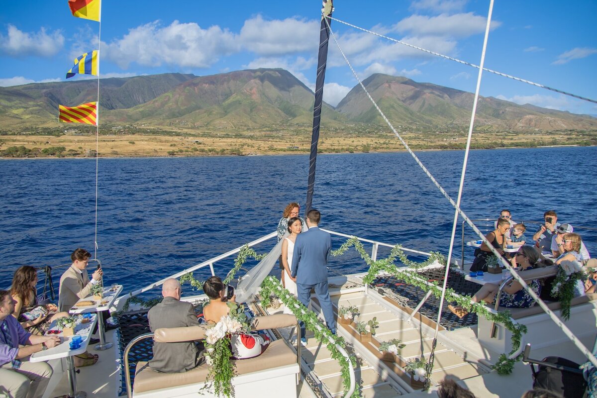 wedding photos on a boat in Maui, Hawaii